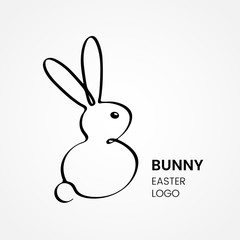 Sketch of a fluffy Easter bunny in a linear style. logo or emblem for easter business.