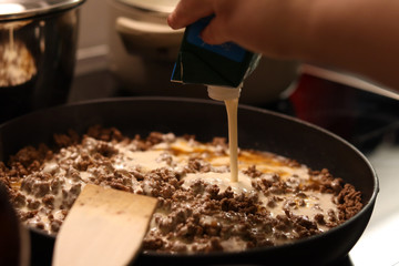 Cooking meat casserole and salad