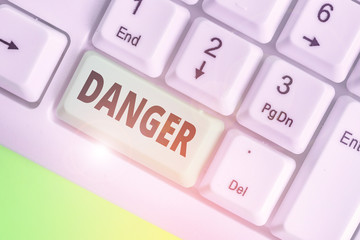 Conceptual hand writing showing Danger. Concept meaning the possibility of something unwelcome or...