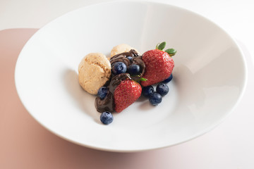 dessert berry fruits with chocolate sauce