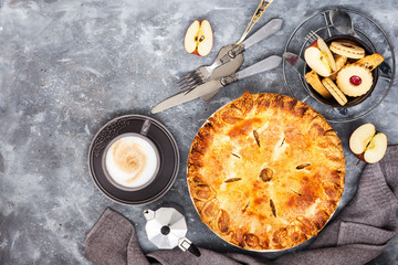 Homemade fresh baked delicious classic  american apple pie, gray background, top view
