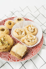 Baklava sweet dessert. Pastry made of layers of filo filled with chopped nuts and sweetened and held together with syrup or honey 