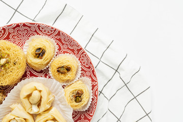 Baklava sweet dessert. Pastry made of layers of filo filled with chopped nuts and sweetened and...