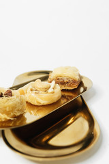 Baklava sweet dessert. Pastry made of layers of filo filled with chopped nuts and sweetened and held together with syrup or honey 