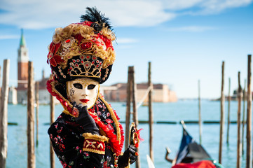 Beautiful colorful masks at traditional Venice Carnival in February 2020 in Venice, Italy