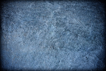 Dark grey navy blue slate background or texture. stone background