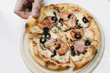 Delicious pizza, traditional Italian cuisine