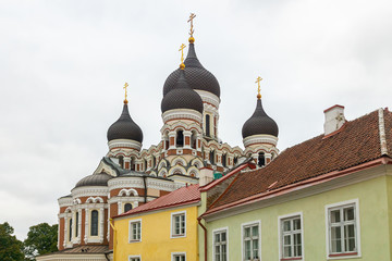 Fototapeta na wymiar Domes of Alexander Nevsky Cathedral in Tallinn is built in a typical Russian Revival on Toompea hill and richly decorated. The largest orthodox cupola cathedral is a must-visit in Estonia, Europe.