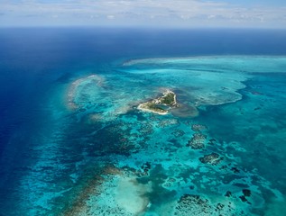 Obraz na płótnie Canvas Aerial views of The Great Blue Hole and Light House Reef in Belize