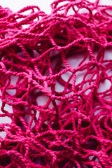 Pink string bag background, net pattern