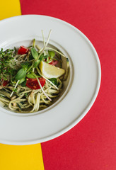 Delicious pasta with tomatoes and herbs 