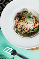 Close-up view of salad in white plate 