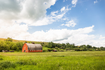 Farm with classic red barn. Montana, USA