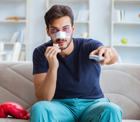 Young man defeated in sports game suffered loss with broken blee