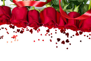 freshly cutted red roses with hearts forming a frame on white background. copy space. Flowers, womens day, mother day, Birthday or st Valentine concept