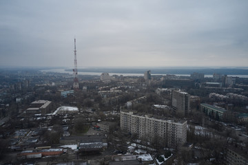 Aerial view of factory pipes throwing hazardous emissions into the air.