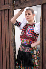 Young beautiful slovak woman in traditional costume