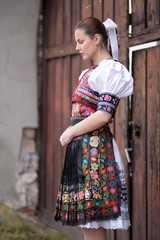 Young beautiful slovak woman in traditional costume