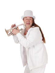 A trumpet player in a white outfit and cylinder, looking back