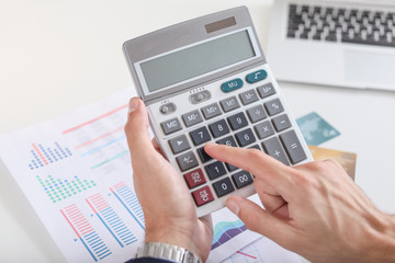 Male bank manager working in office, closeup