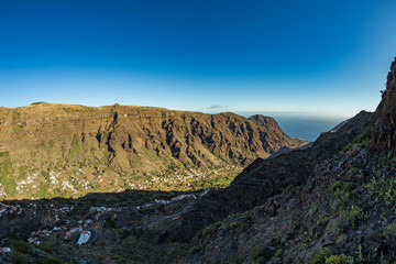 Parking at the observation point overlooking the gorge Valle gran Rey - Grate King Valley. Viewpoint and restaurant constructed by canarian architect Cesar Manrique. La Gomera, Canaryislands, Spain