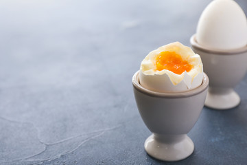 Tasty boiled eggs on table
