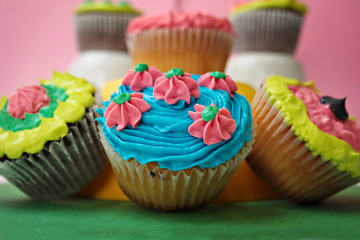 colorful cupcakes with flower