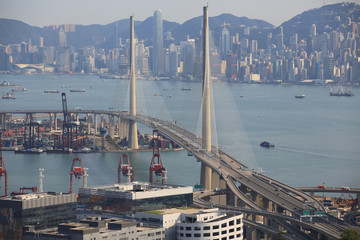 Stonecutters' Bridge and Kwai Tsing container terminal port view in drone - obrazy, fototapety, plakaty