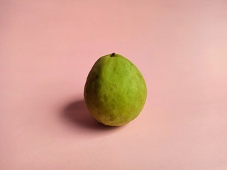 Guava on pink background. typical fruit of Guatemala