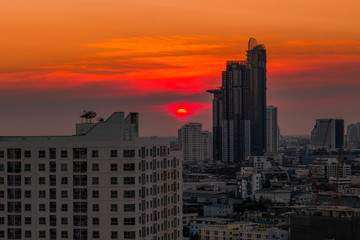 Fototapeta premium The abstract background of the evening sky and the surrounding buildings, showing the distribution of housing in the capital