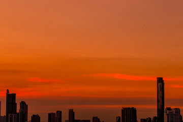 The abstract background of the evening sky and the surrounding buildings, showing the distribution of housing in the capital