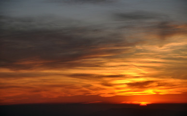 Fototapeta na wymiar Beautiful sunset sky background with clouds