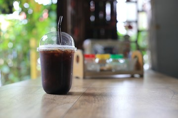 glass of coffee on table in cafe