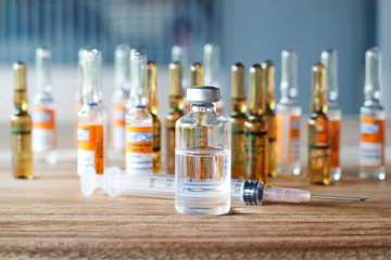 Medicine concept, Glass bottles with liquid medicine and dose of serum, insulin, Healthcare and medical.