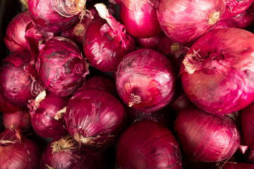 A lot of piece of red onion close up