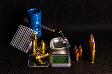 Modern Reloading cartridges to recycle ammunition using brass casing and bullets for gun or rifle