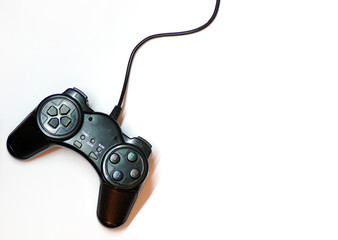 The gamepad for playing video games is isolated on a white background. Joystick with black wire. Game equipment. Template for the designer. Gamers.