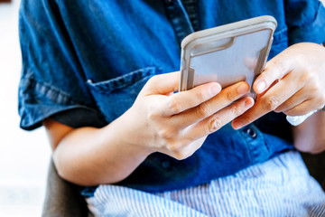 image of people using a smartphone.