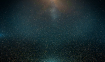 Abstract retro 1920 style vintage background of flickering gold tone particles and light flare