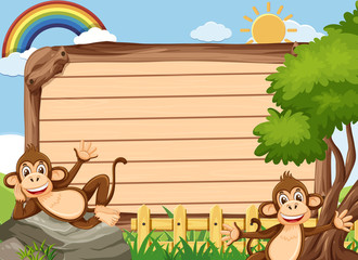 Wooden sign template with two monkeys in the park
