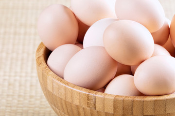 A background of farm fresh brown eggs