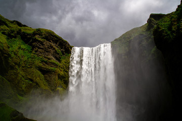 Dramatic scene of tourist popular Skógafoss waterfall, Iceland
