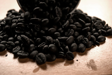 coffee beans on black background with copy space for text