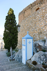 ruins of old castle in Castell de Guadalest with stations of the cross, Spain