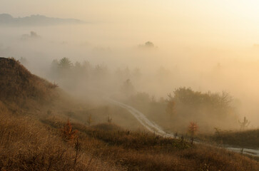 The hills in the fog. Morning landscape