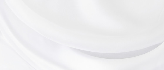 White gray satin texture that is white silver fabric silk panorama background with beautiful soft blur pattern natural.