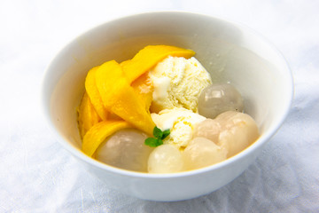 Garnished lychee and vanilla ice cream