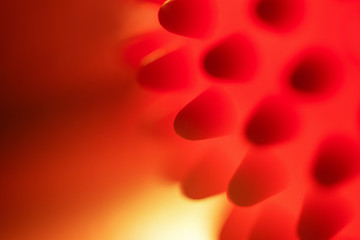 Blurred red abstract background. Chinese Coronavirus. Closeup microscopic view of  2019-nCoV coronavirus  or HIV, cancer floating in a liquid. Bacterium, red infection.
