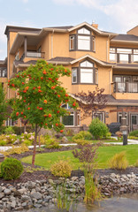 Fototapeta premium Outdoor landscape garden with pond in Peachland, British Columbia.