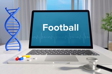 Football – Medicine/health. Computer in the office with term on the screen. Science/healthcare